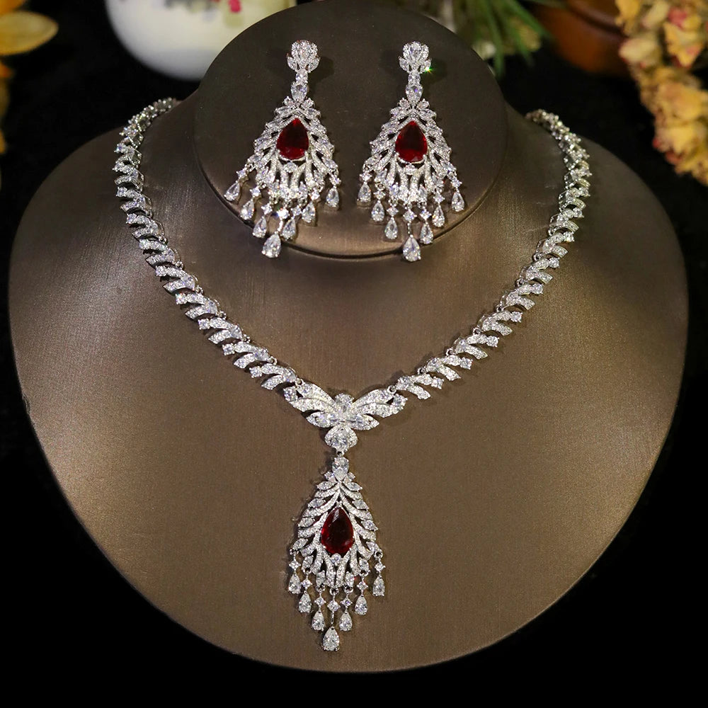 Exquisite silver bridal necklace and chandelier earrings with teardrop ruby red crystal elements