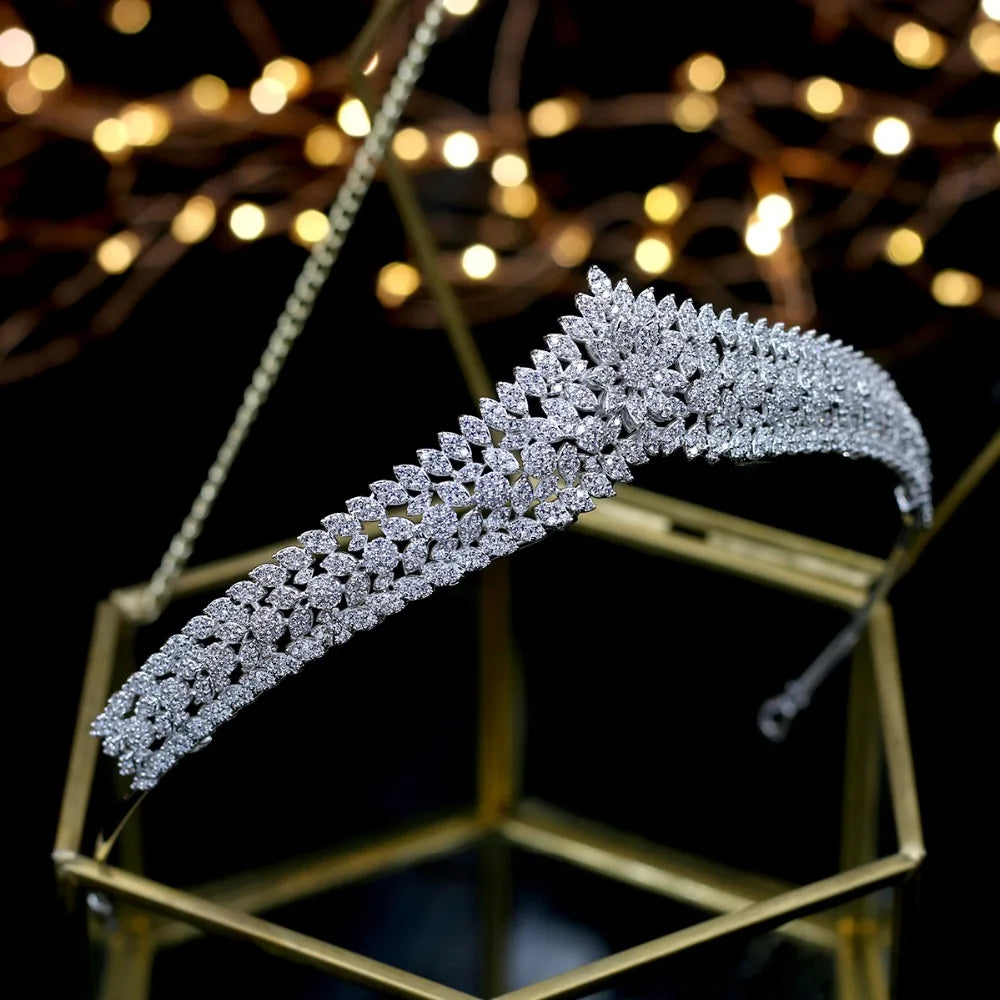 High-angle side view of the silver-plated wedding hair accessory tiara, highlighting the dense pave stone settings on the metal frame.