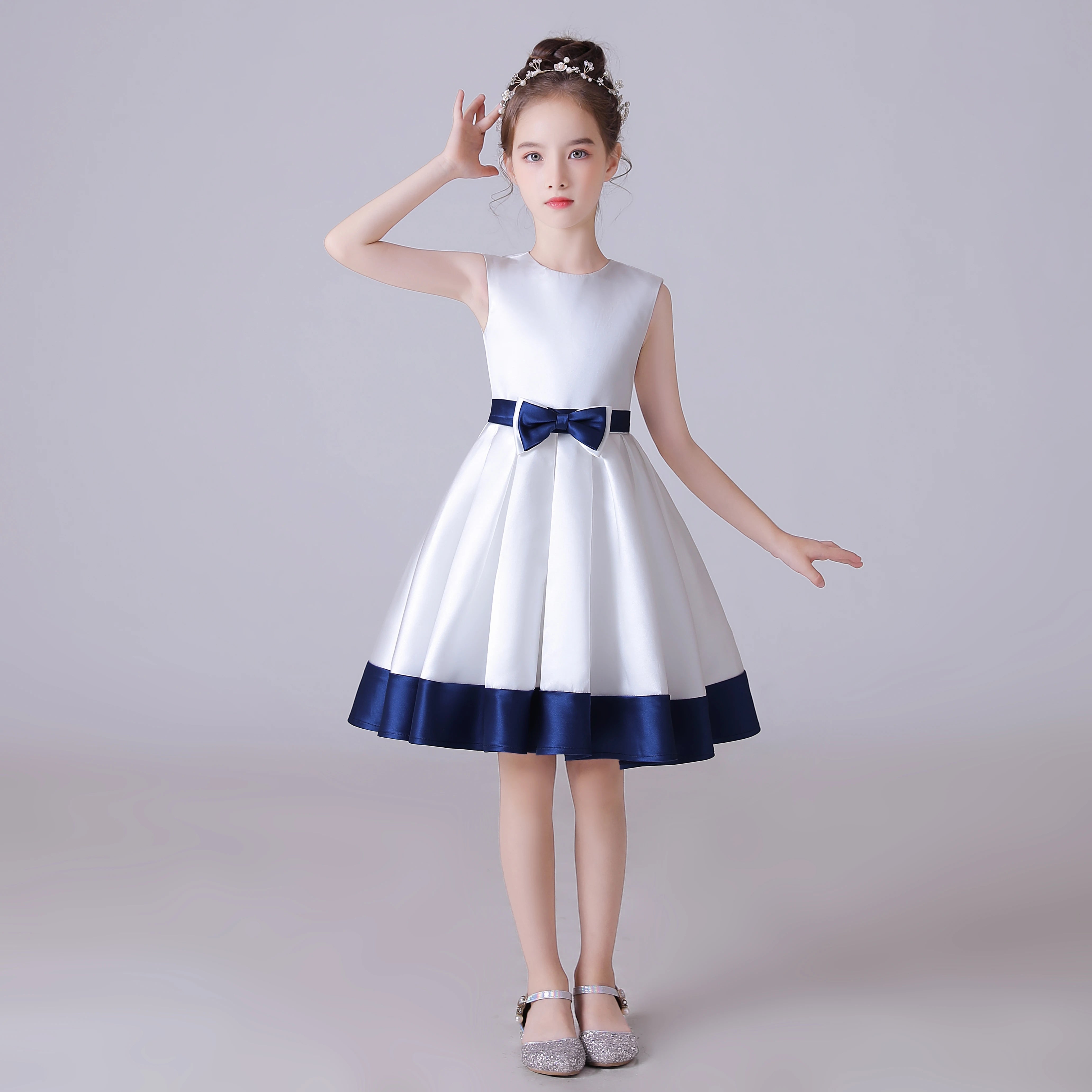 Sleeveless Elegant Satin Girls Dress with Navy Blue Bow and Stylish He   Elsi John
