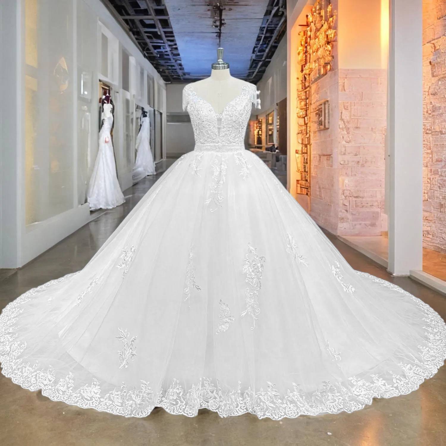 Front perspective of a luxury 2-piece wedding dress set featuring a fitted mermaid gown and a dramatic detachable chapel overskirt in a bridal boutique.