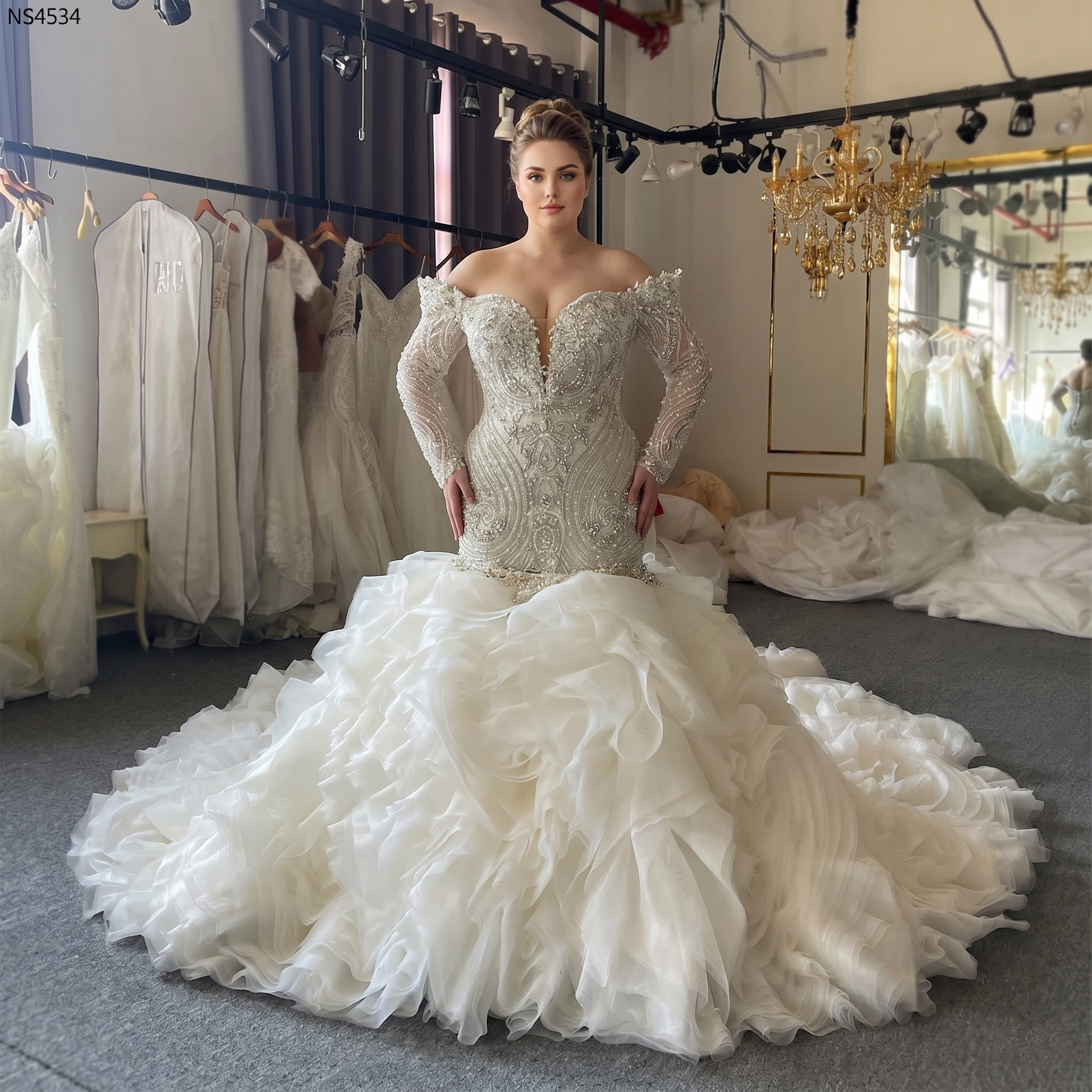Elegant front pose of a plus-size bride in a heavily beaded mermaid wedding gown with long sleeves, showcasing the grand volume of the detachable royal train.