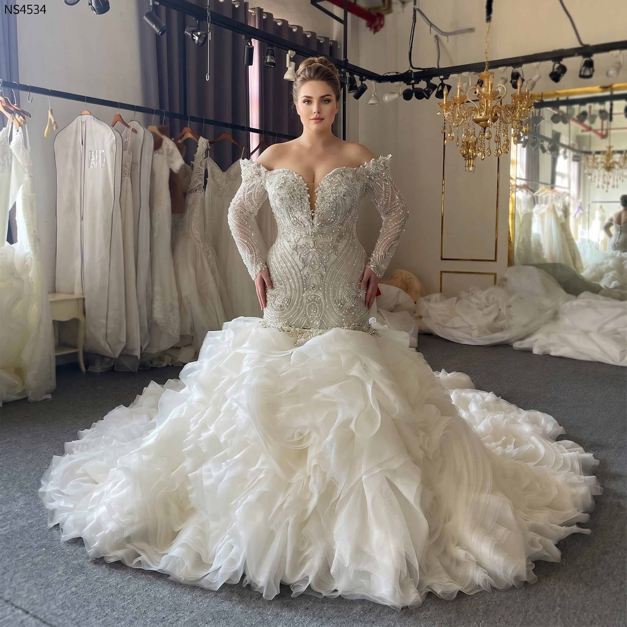 Elegant front pose of a plus-size bride in a heavily beaded mermaid wedding gown with long sleeves, showcasing the grand volume of the detachable royal train.
