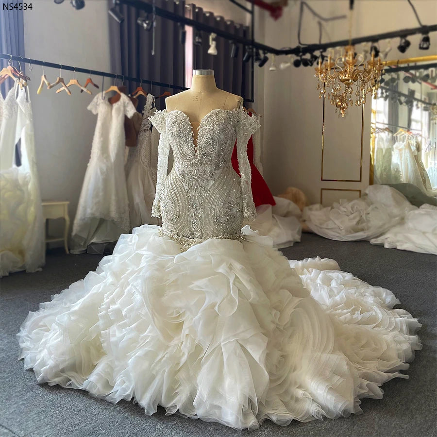 Full back view of a royal-style 2-in-1 wedding dress, emphasizing the wide-sweep sparkling train and detailed lace-up closure for a perfect plus-size fit.
