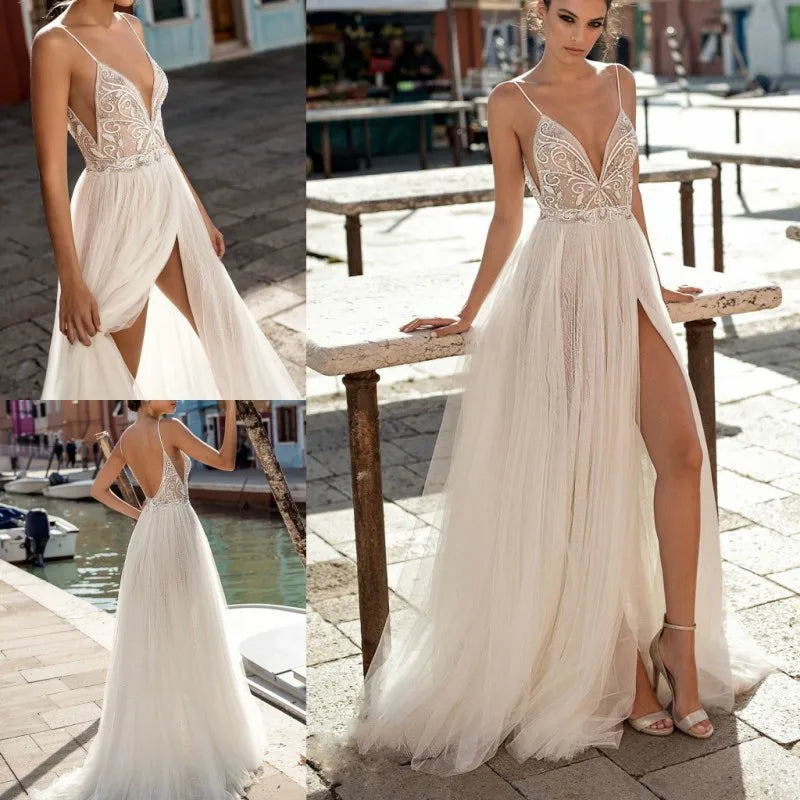 A detailed look at a bride in a boho tulle wedding dress featuring a pearl-embellished backless design, spaghetti straps, and a high side split.