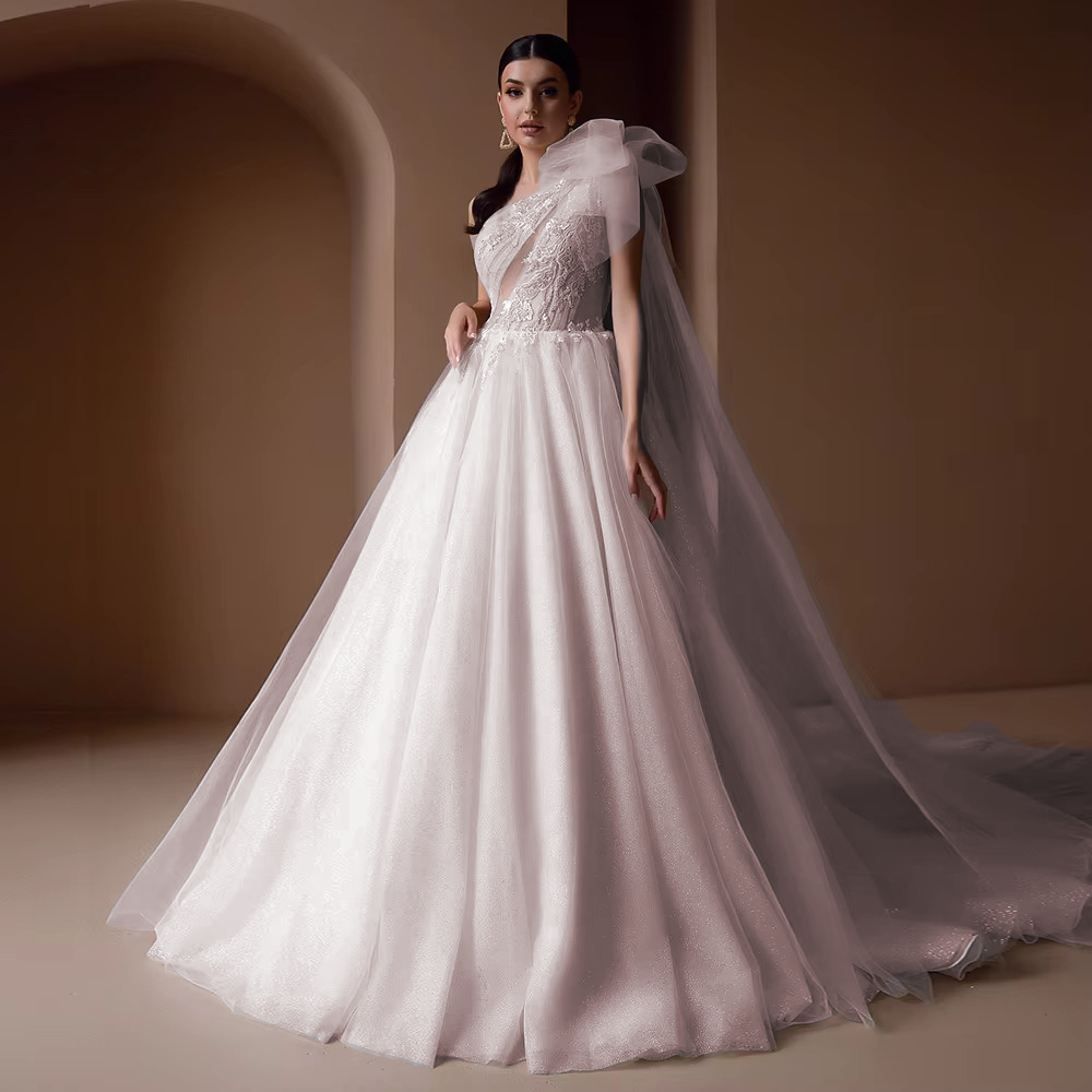 Full-length studio display of the luxury A-line off-shoulder vestido de noiva, featured in a timeless crisp soft white shade option.