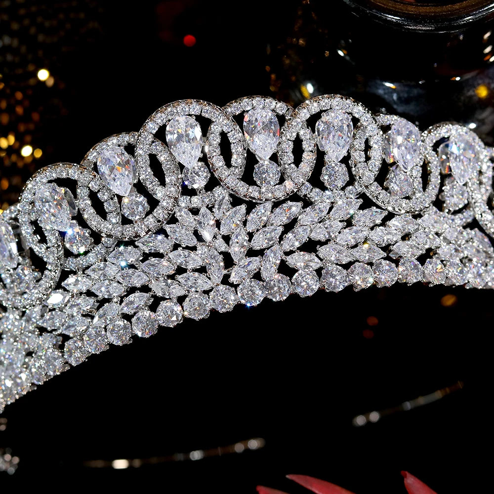 Detailed macro view of the intricate zircon crystal setting and teardrop stones on a baroque wedding crown