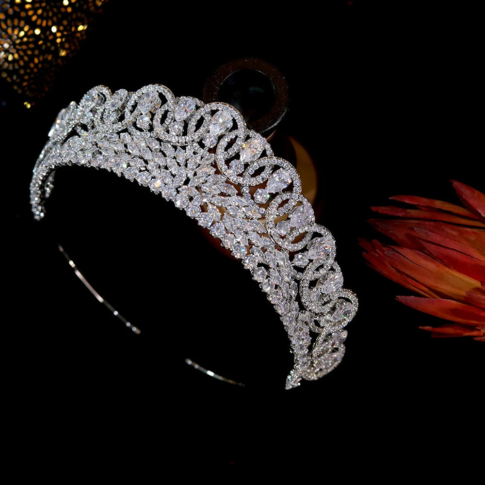 Premium crystal wedding tiara headband highlighted under studio lighting, showcasing the elaborate baroque scrolls