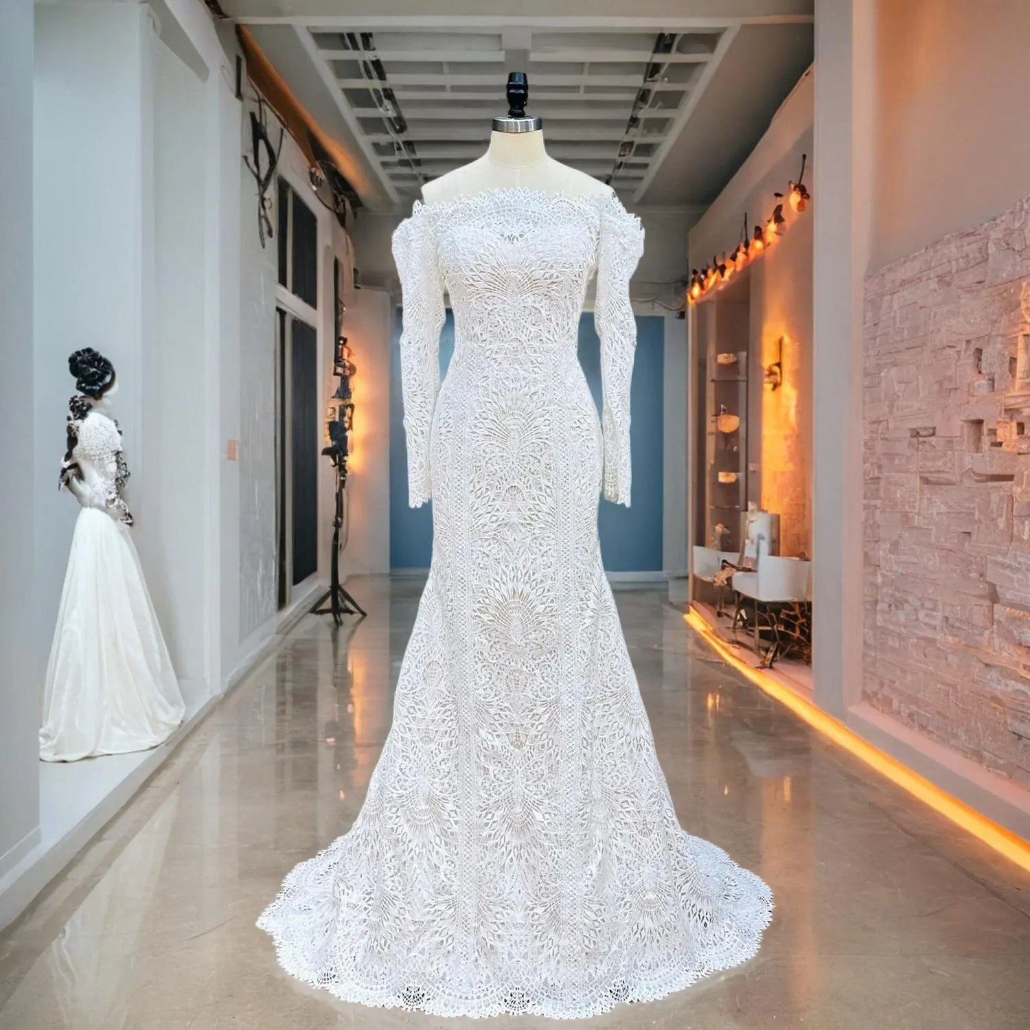 Mannequin display of a shimmering long sleeve lace mermaid wedding dress featuring a deep plunging V-neckline and an expansive lace-trimmed train.