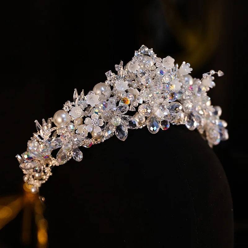 Elegant silver crystal and pearl bridal headpiece for weddings and formal party styling