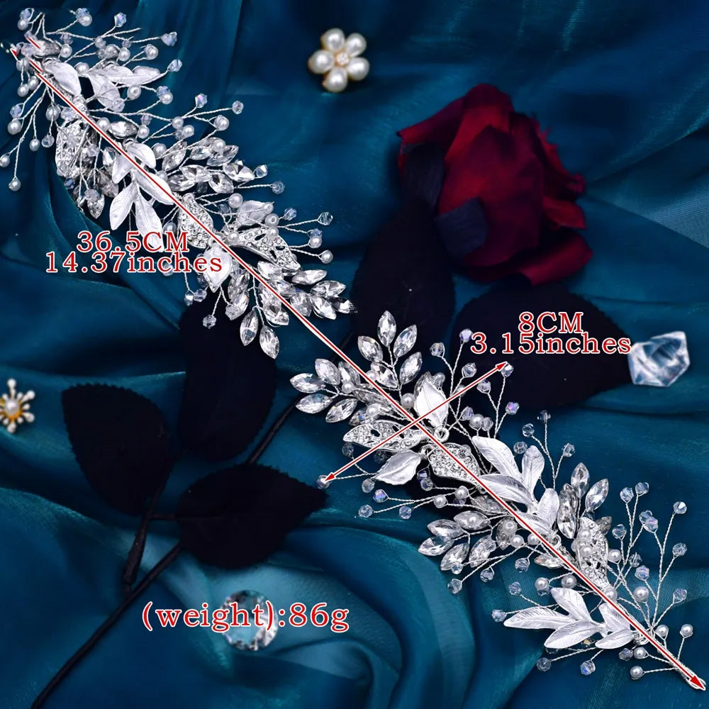 Product sizing diagram for a flexible crystal bridal hair vine, indicating a total length of 36.5 cm (14.37 inches), a width of 8 cm (3.15 inches), and a weight of 86g against a teal satin background.