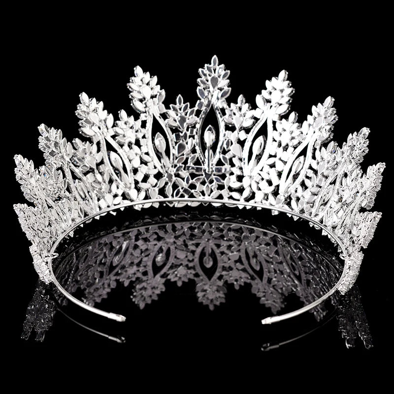 An elegant gold crystal crown designed as a luxury bridal hair accessory.