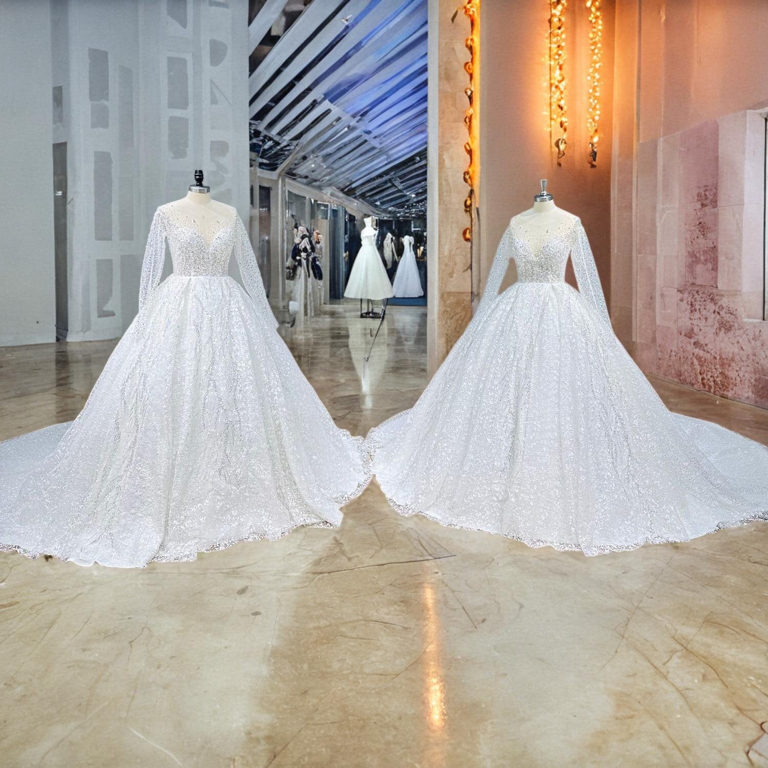 Two mannequins side-by-side in a bright studio space, both showcasing the radiant front view of a crystal beaded shining ball gown wedding dress with long sleeves.