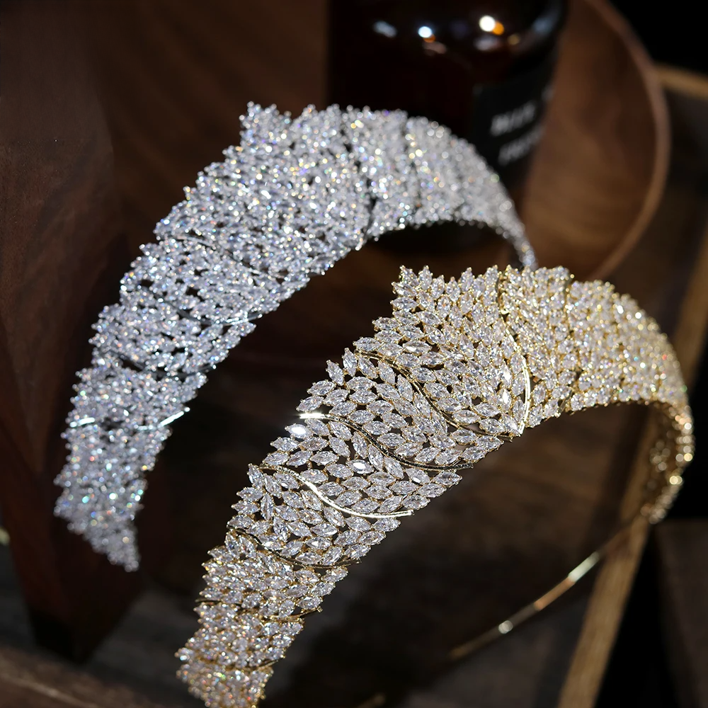 Alternate top-down view of the glittering silver and gold princess tiara crowns, demonstrating the intricate leaf-shaped scrollwork.