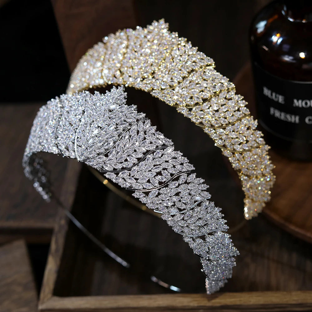 Side-by-side display of silver and gold baroque princess headband crowns showcasing dense cluster crystal patterns.