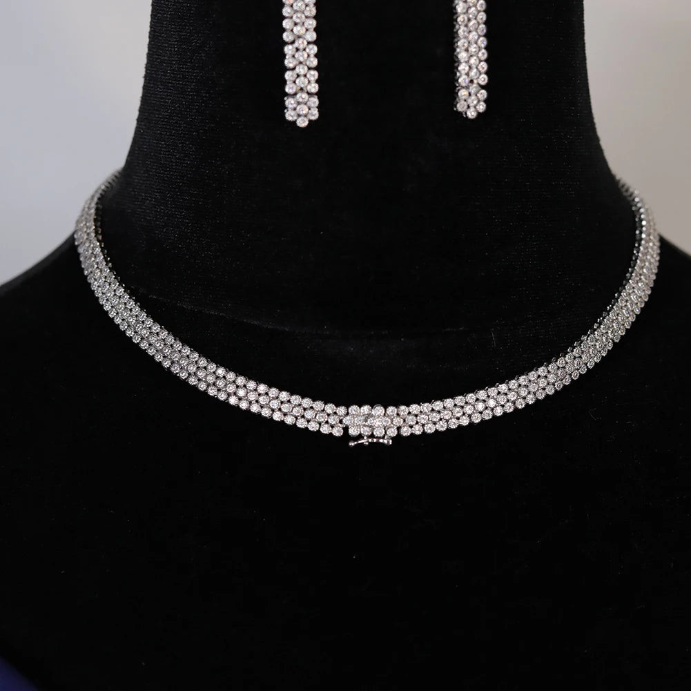 Detailed view highlighting the secure cluster clasp closure of the three-row cubic zirconia bridal wedding necklace.