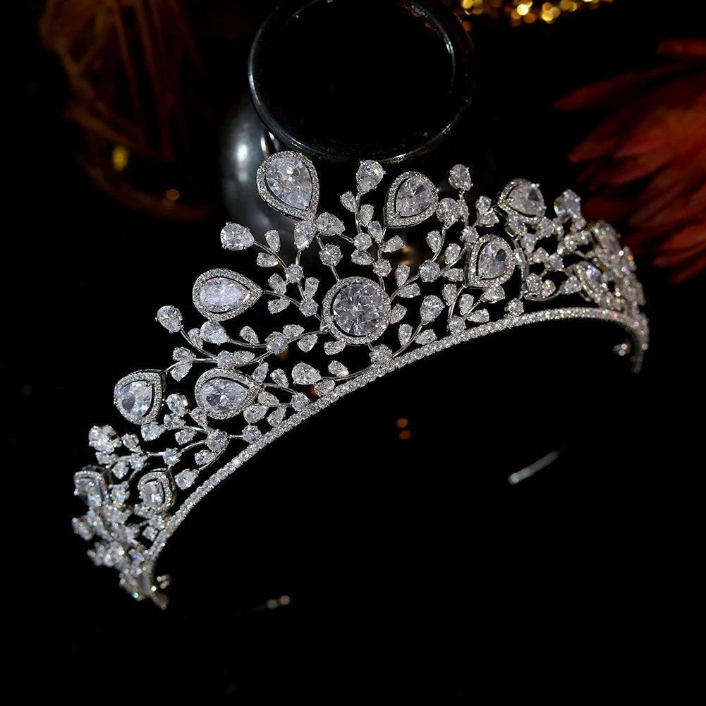 Premium cubic zirconia princess tiara headpiece highlighted under studio lighting to emphasize brilliant stone cuts.