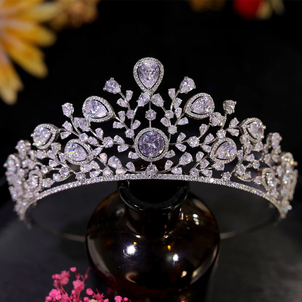 Full view of a handcrafted cubic zirconia bridal headpiece hair accessory for women, presented on a dark vanity table.