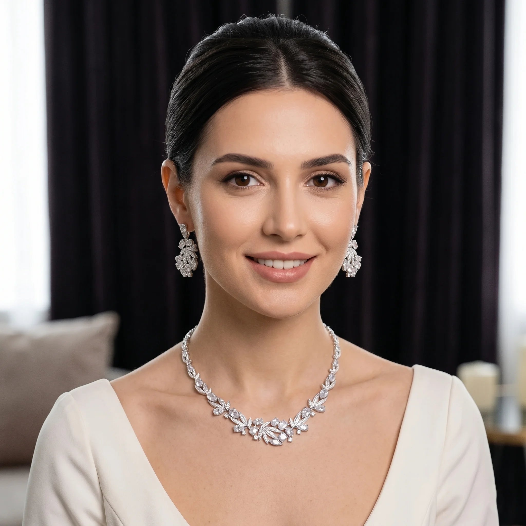 Model wearing a cubic zirconia choker necklace and matching leaf-design dropdown earrings for a bridal wedding look.