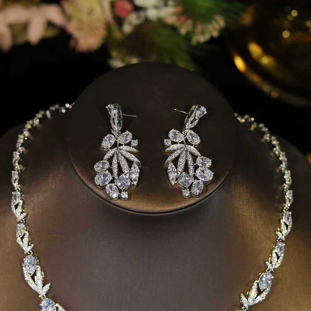 Detailed view of elegant cubic zirconia dropdown statement earrings from a bridal wedding jewelry collection.