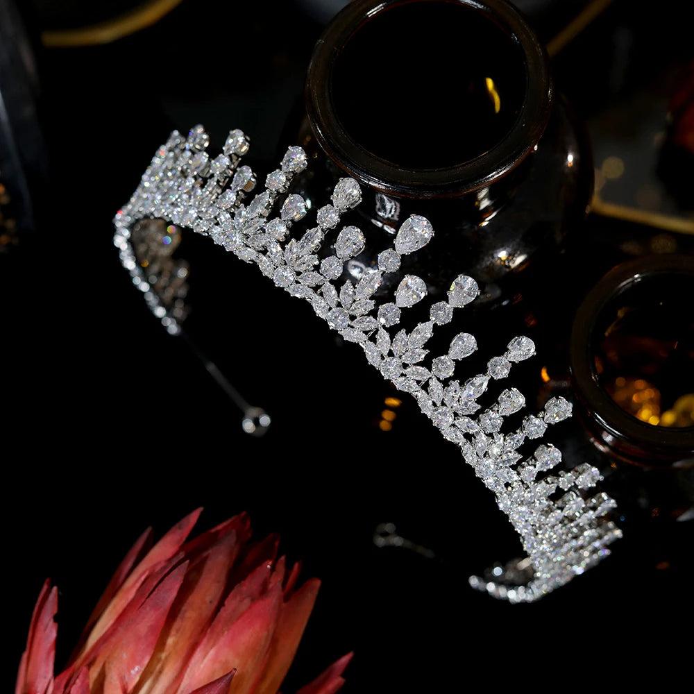 Left-angle close-up view of a sparkling cubic zirconia wedding tiara highlighting teardrop crystal patterns