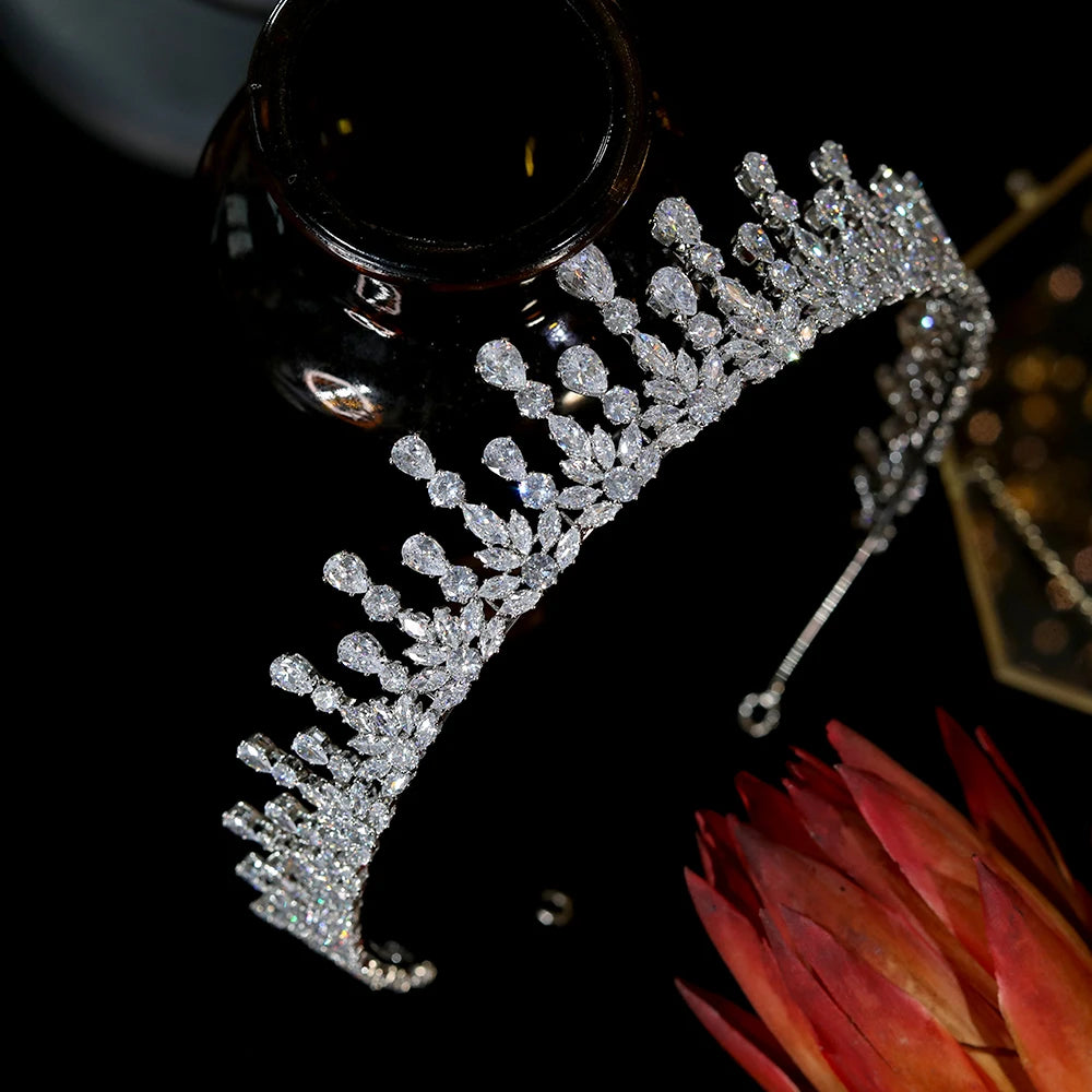 Right-angle view of a premium cubic zirconia bridal crown showing the intricate leaf and stone clusters