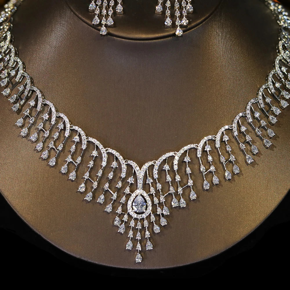 High-end cubic zirconia bridal necklace showcasing a detailed teardrop centerpiece and cascading crystal tassels.