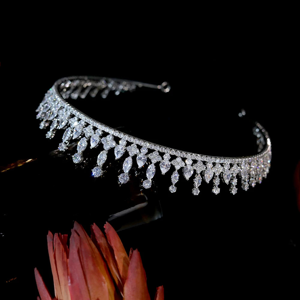 Combined product overview showing a high-end crystal prom tiara with a detailed inset zoom of the crown’s rhinestone tips.