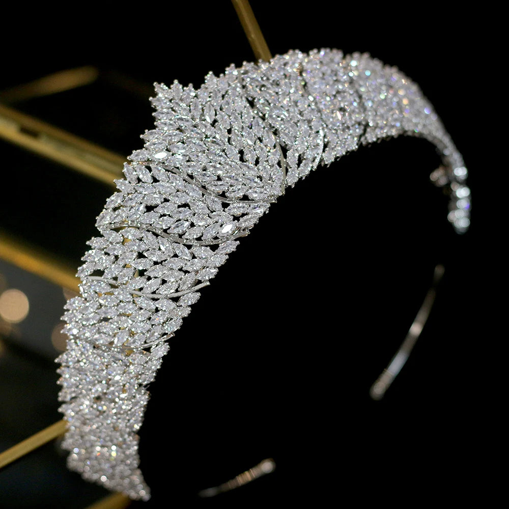 High-angle side view showcasing the detailed overlapping crystal leaf patterns of a premium silver wedding headpiece headband.