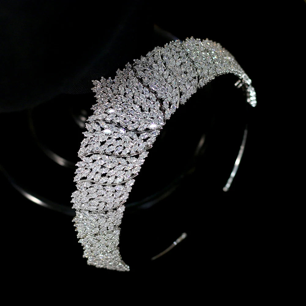 Overhead detailed view of a thick cubic zirconia princess tiara crown highlighting the dense cluster of marquise-cut gems.