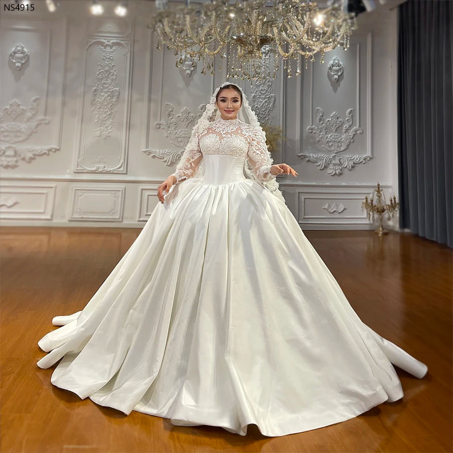 Full-length view of an elegant nude taffeta ball gown featuring a high-neck lace illusion bodice and a structured corset waist.