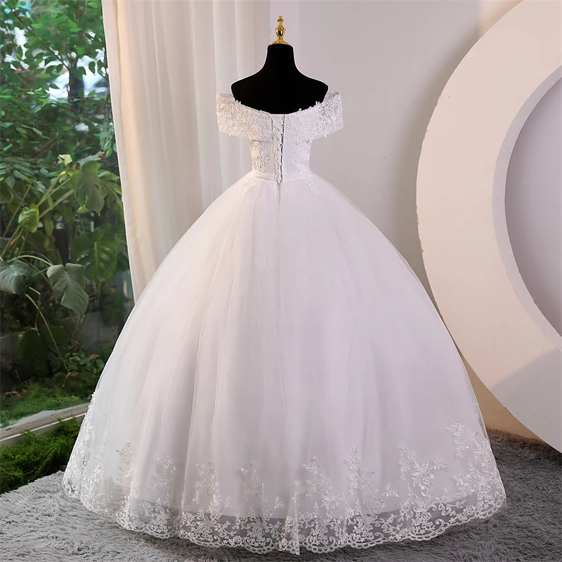Elegant studio front display of the plus size lace applique ball gown dress, showcased in a sophisticated warm champagne or light ivory tone variant.