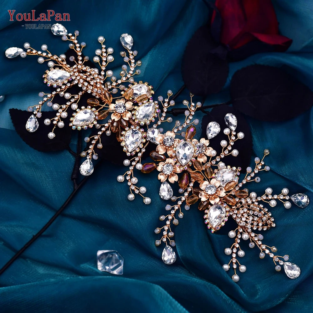 Close-up top view of a flexible rose gold wedding headpiece with intricate wire vine branches, marquise crystals, and small white pearls.