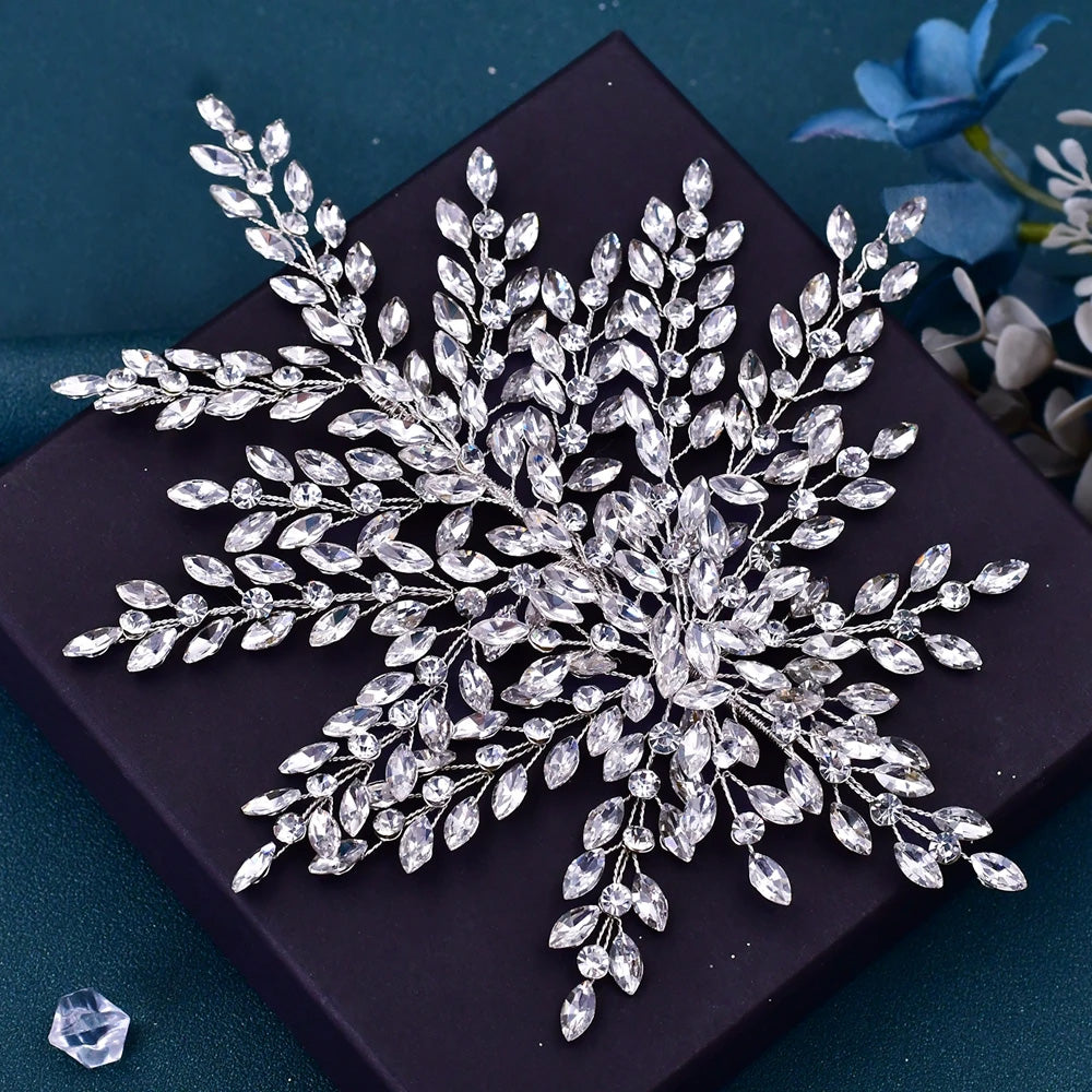 Alternative angle of the handmade crystal bridal headpiece, displaying the detailed wirework and arrangement of shimmering rhinestone leaves.
