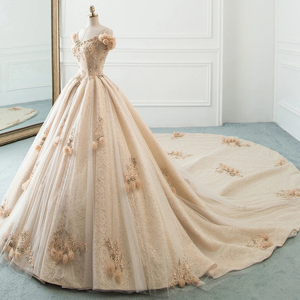 Full-length view of an elegant, handmade floral A-line bridal gown with a chapel train, presented on a mannequin.