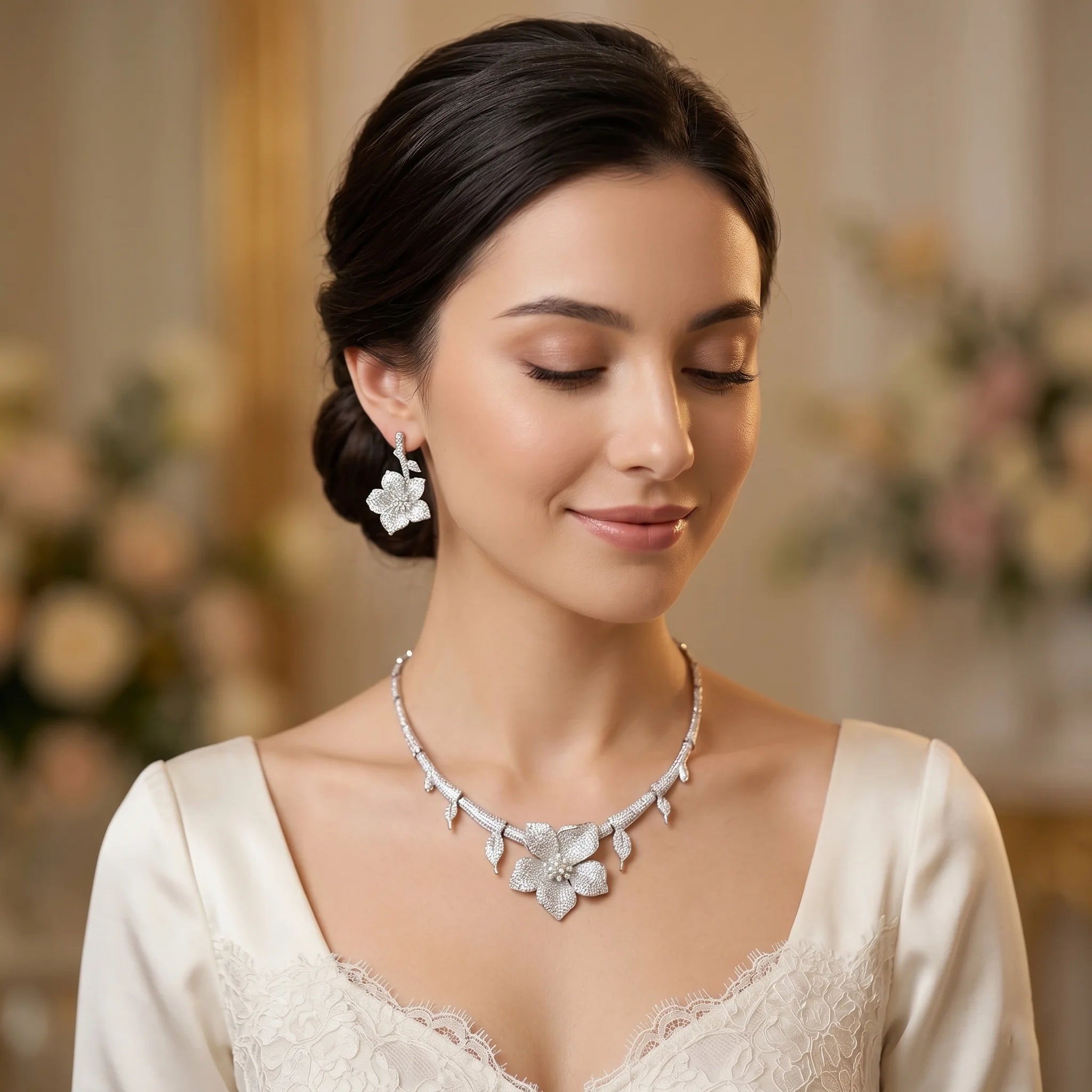 Model wearing an elegant white flower cubic zirconia bridal necklace and matching flower earrings