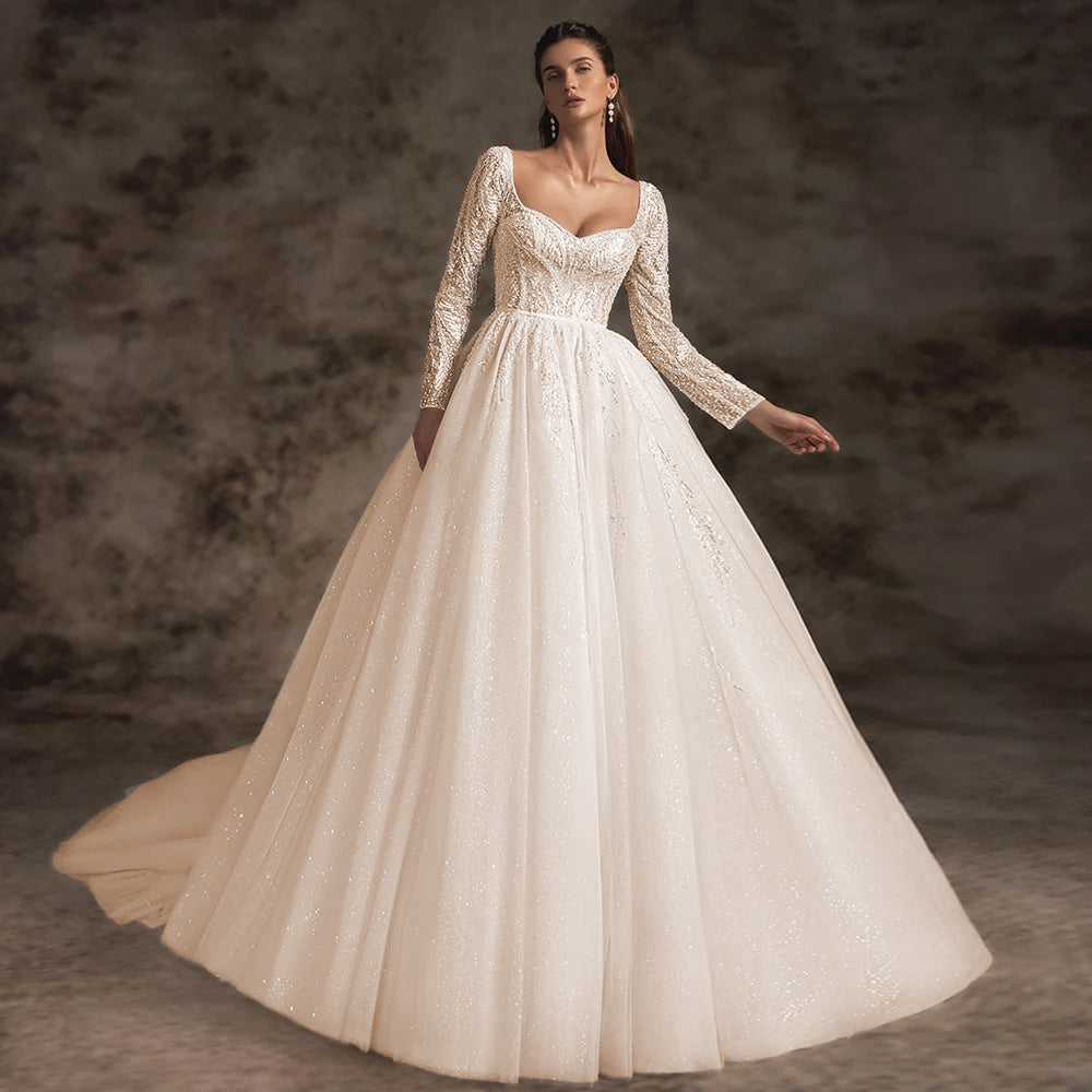 Close-up portrait of a bride wearing an A-line wedding dress featuring elegant lace appliques, floral details, and a sophisticated V-neckline.