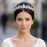 Close-up portrait of a model wearing a premium marquise cubic zirconia bridal tiara hair accessory for weddings and prom.