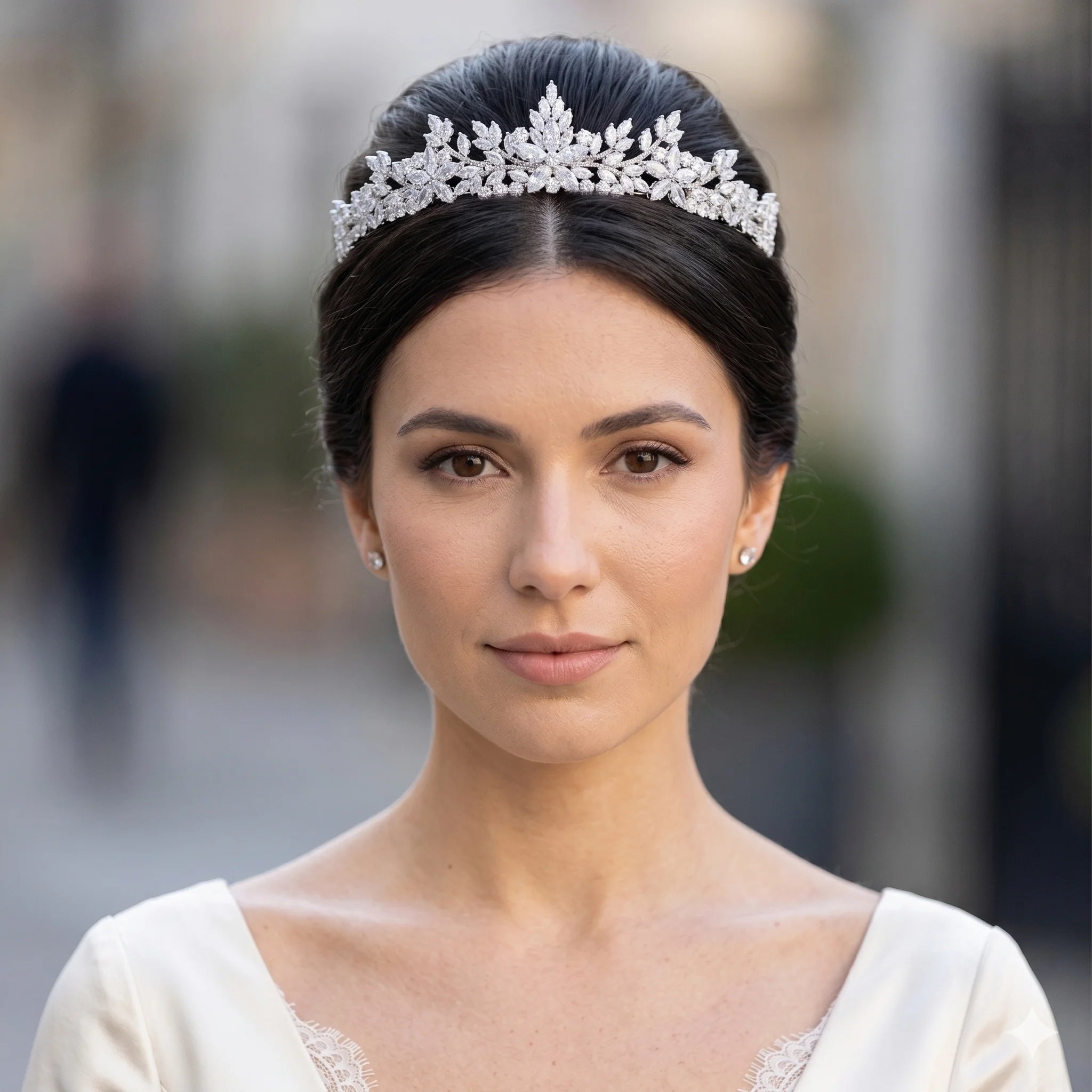 Close-up portrait of a model wearing a premium marquise cubic zirconia bridal tiara hair accessory for weddings and prom.