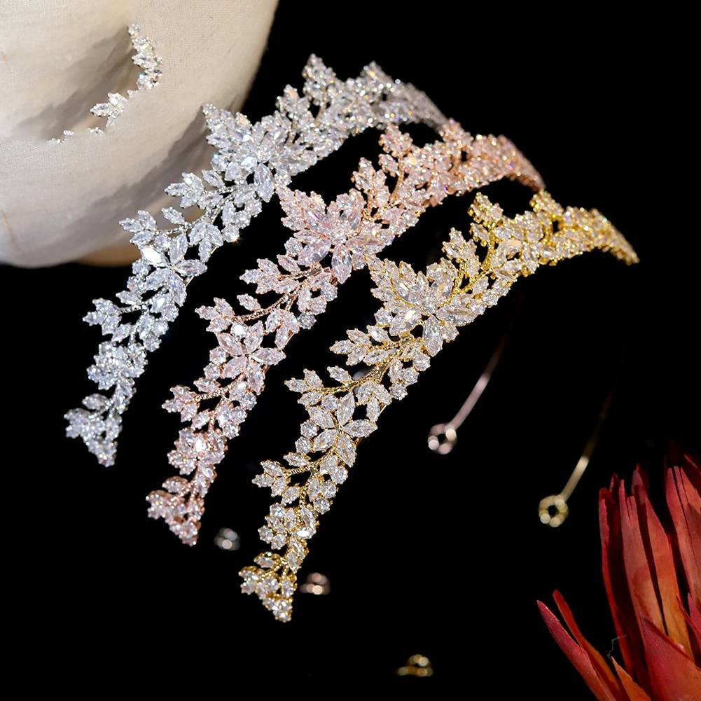 Direct overhead view comparing three fashion tiara crowns in silver, rose gold, and yellow gold crystal leaf finishes.