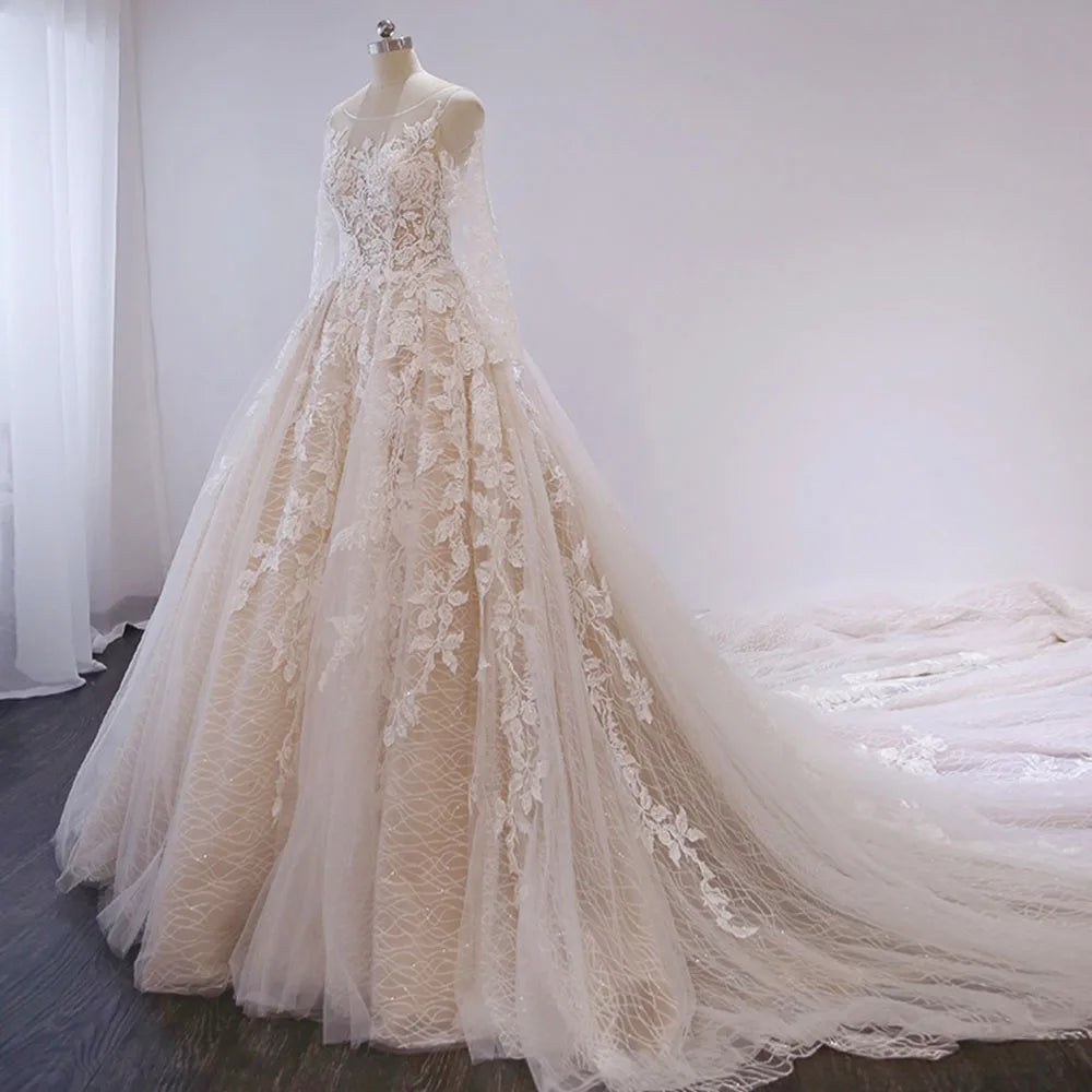 Sophisticated front-facing view of a full sleeve A-line wedding dress adorned with intricate beaded appliques.