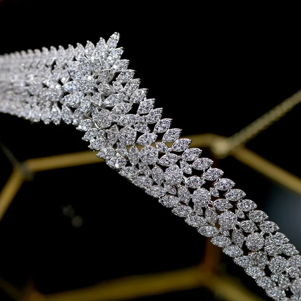 Detailed macro shot focusing on the multi-row alignment and brilliant cut of the micro-pave crystals on the bridal headpiece band.
