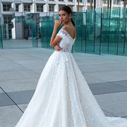 Luxury Polka Dot Wedding Dress with 3D Beaded Flowers – Shimmering Bridal Gown