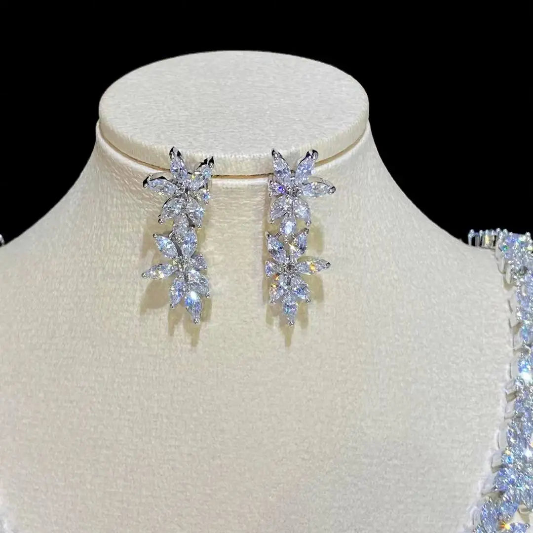 Detailed view of the elegant marquise crystal floral dropdown statement earrings from a 2pcs bridal jewelry collection.
