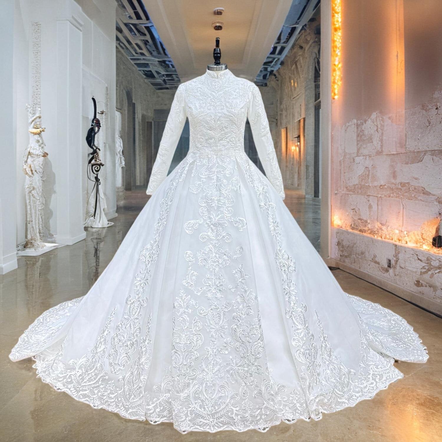 Mannequin displaying a high-neck long-sleeve princess bridal ball gown with ornate lace embroidery in a boutique setting.