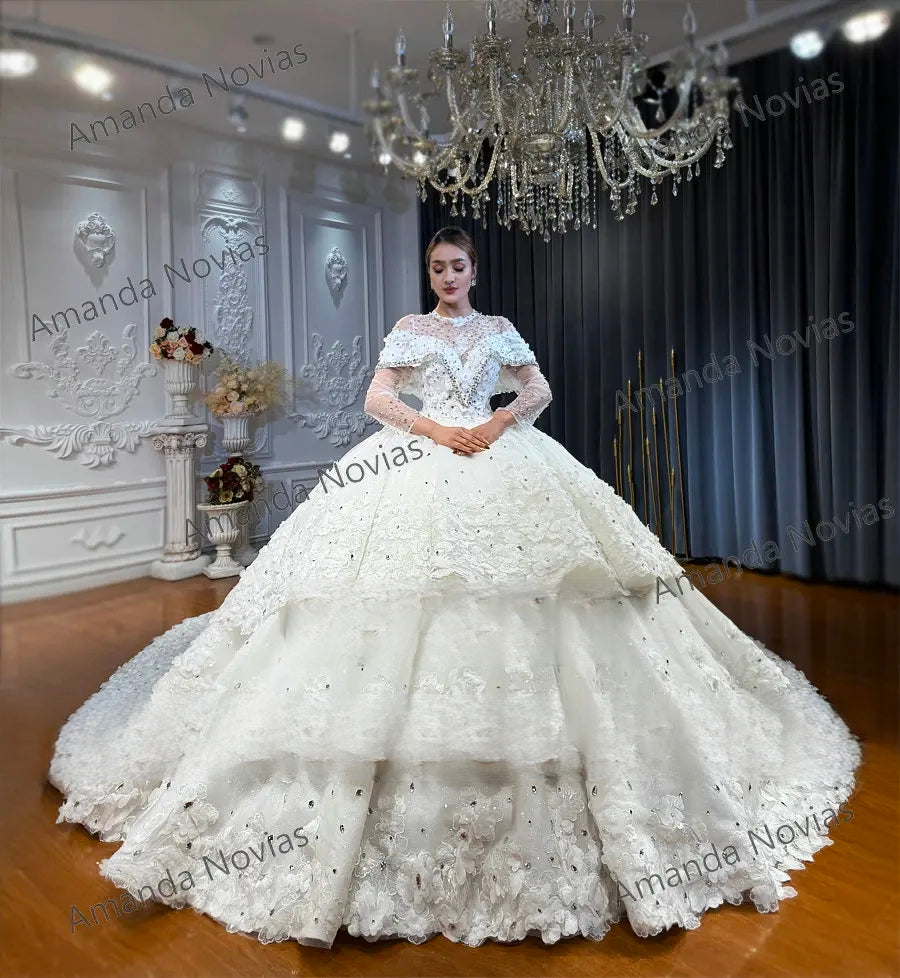 Angled front view of an exquisite ball gown wedding dress on a mannequin, demonstrating the structural volume of the layered tiered skirt and shimmering lace floral patterns in a bridal showroom.
