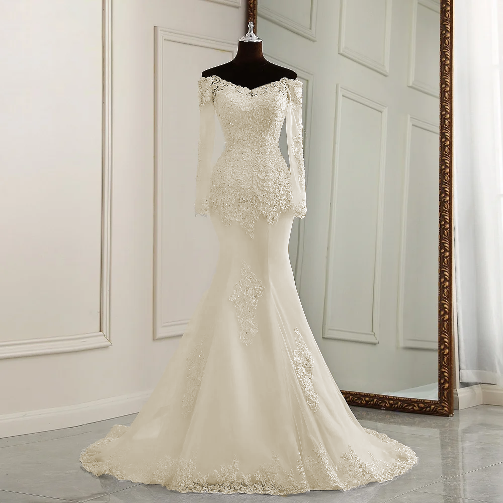 A mannequin view of an elegant, off-the-shoulder long-sleeve mermaid bridal gown, showcasing the sophisticated lace detailing and slim fit.