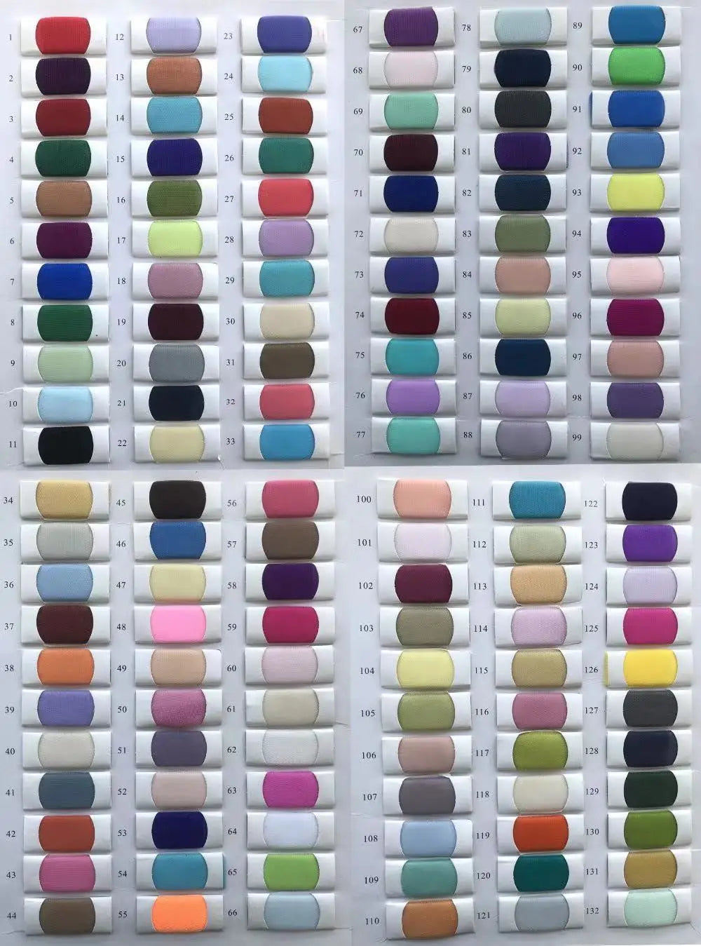 Comprehensive numbered textile fabric color chart presenting premium mesh and satin material swatches for custom-tailored wedding dresses.