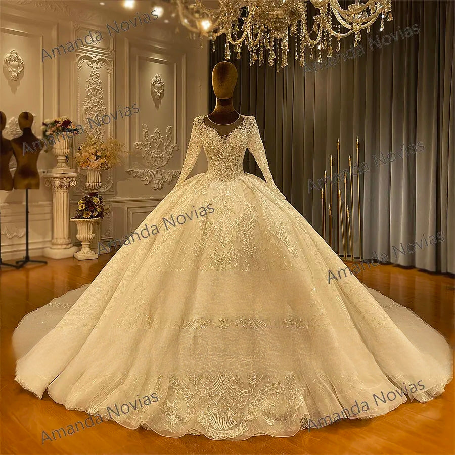 A grand ball gown wedding dress with a detachable train displayed in a boutique setting, highlighting the expansive circular train and the brilliant light-reflecting qualities of the sequined fabric.
