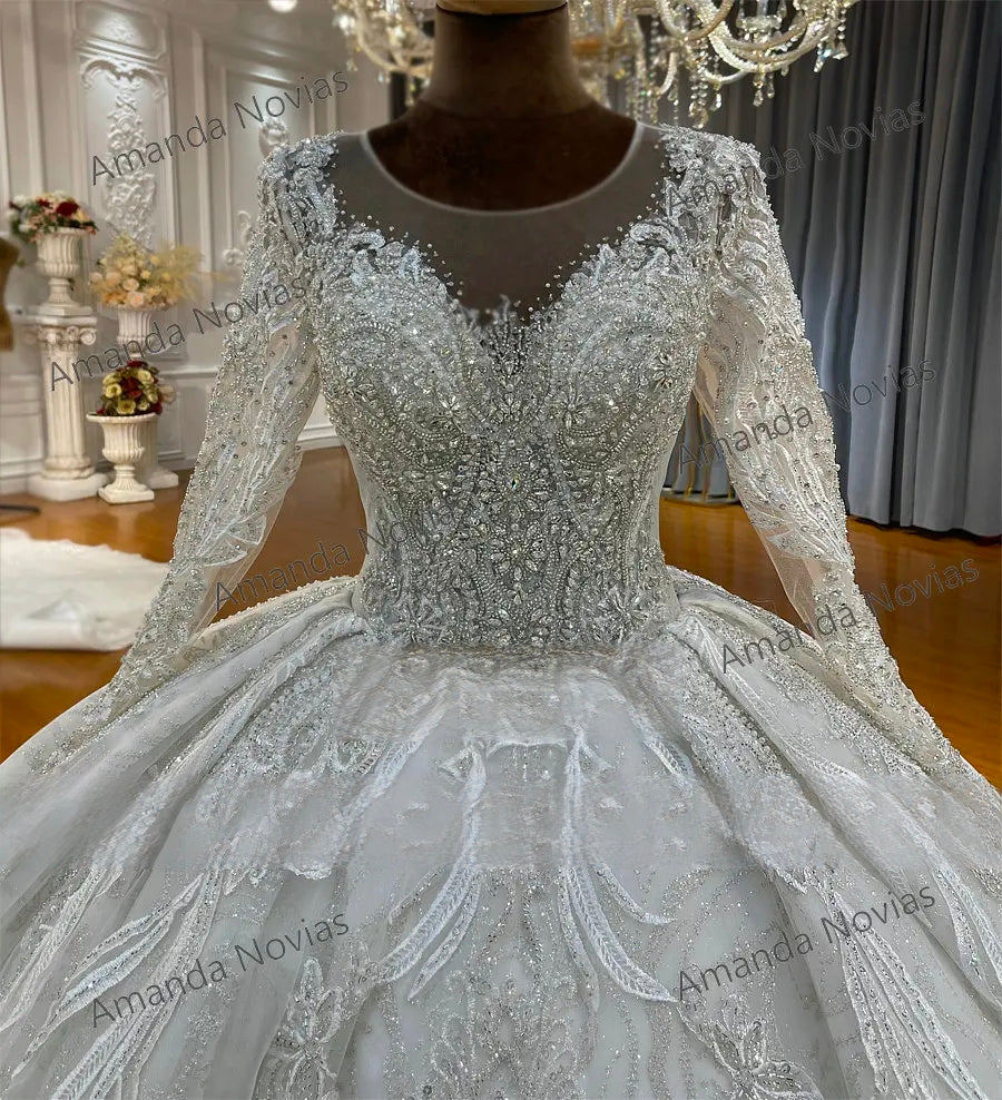 Close-up detail of the beaded wedding dress bodice, showcasing the high-quality craftsmanship of the silver floral lace appliques, radiant sequins, and delicate illusion neckline.