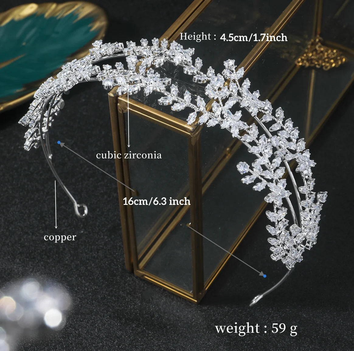 Detail shot showing the dimensions of a cubic zirconia and copper bridal headpiece.